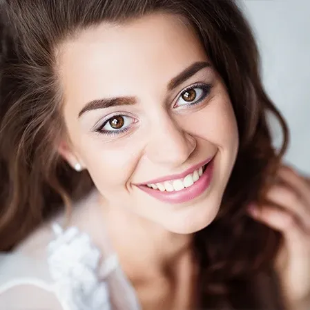 A beautiful bride showing her straight white teeth