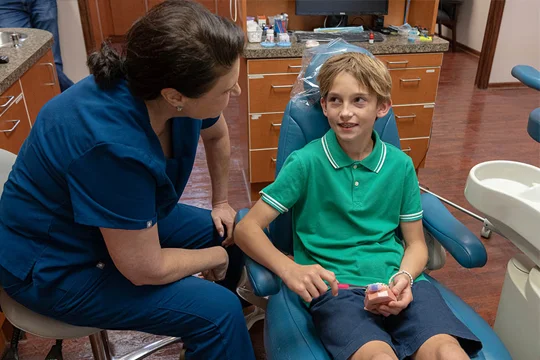 Dr. Monika with a pediatric patient