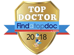 A badge celebrating being a Top Doctor 2018