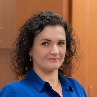 A headshot photo of Aneta