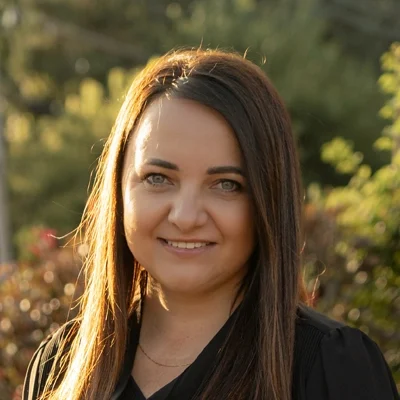 A headshot photo of Olga